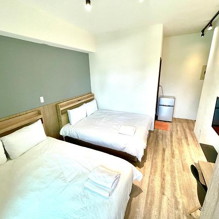 Fengchia Comma Inn Taichung Esterno foto