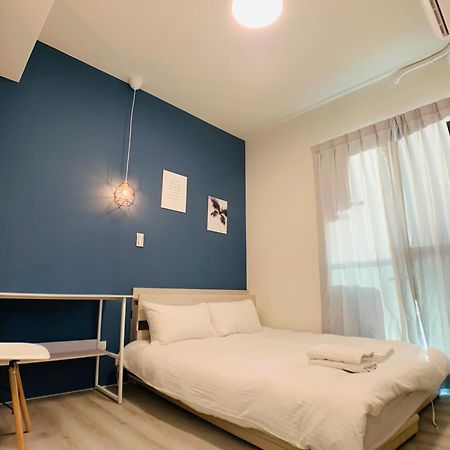 Fengchia Comma Inn Taichung Esterno foto
