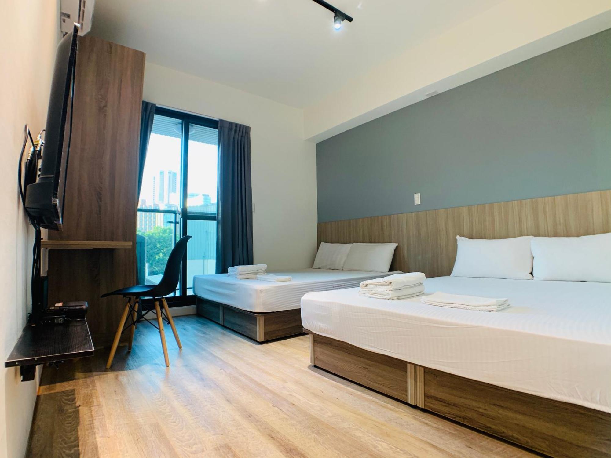 Fengchia Comma Inn Taichung Esterno foto