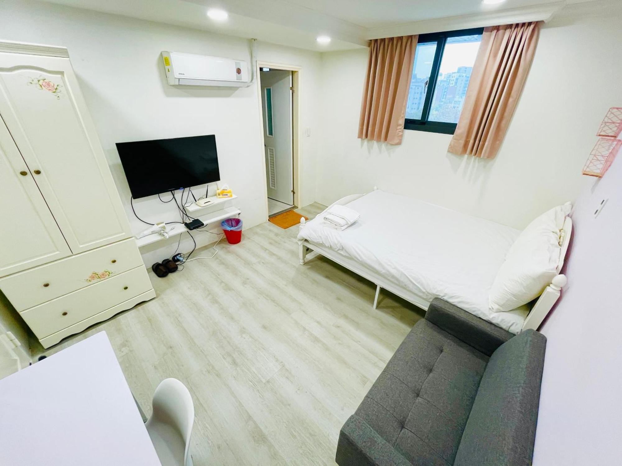 Fengchia Comma Inn Taichung Esterno foto
