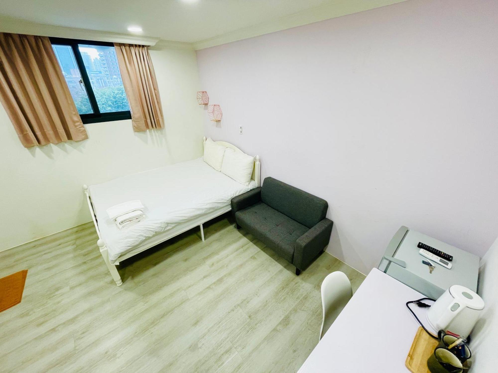 Fengchia Comma Inn Taichung Esterno foto