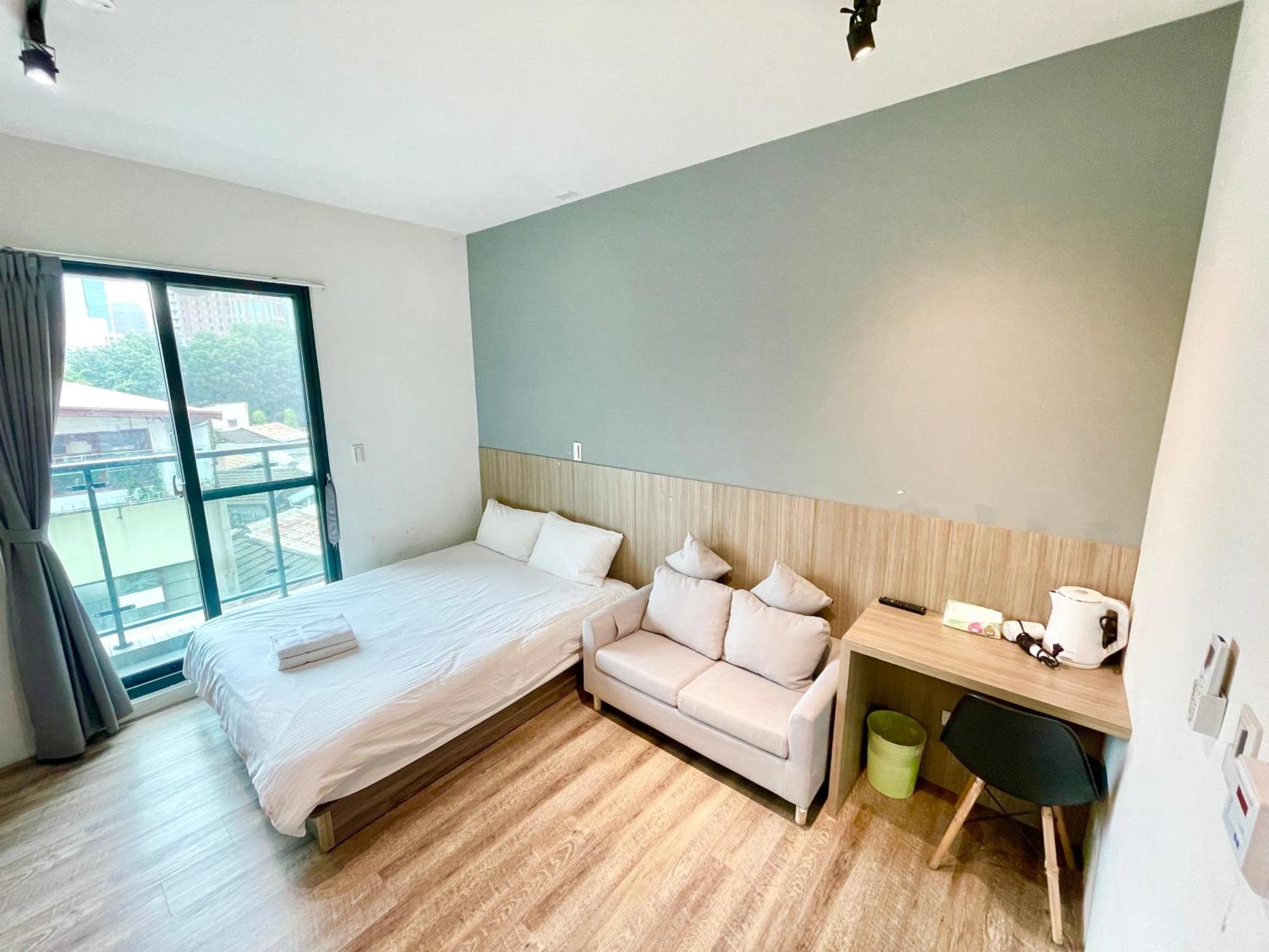 Fengchia Comma Inn Taichung Esterno foto